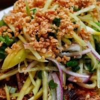 Soft Shell Crab · Soft shell crab breaded and deep fried topped with mango salad and peanuts