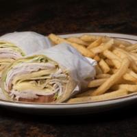 Turkey Wrap · Sliced turkey with lettuce, tomato, American cheese and mayo.