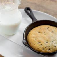 Cast Iron Cookie A La Mode · Served with Vanilla Ice Cream