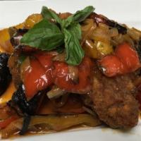 Pork Chop Milanese · Breaded and pan fried; hot or sweet pepper sauce