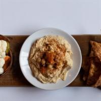 Mediterranean Platter · Hummus, Harissa, Marinated Vegetables, Chickpea Salad, Locally-made Pita.