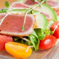 Seared Tuna Salad · Tuna togarashi, mixed greens, avocado, watermelon, wasabi peas, cherry tomatoes, lemon-wasab...