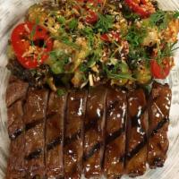 Korean Bbq Steak · Crispy brussels sprouts, kimchi, pickled fresno peppers.
