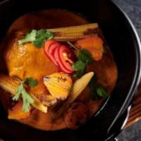 Coconut Chicken Curry · Red coconut curry, baby corn, carrots, crispy shallots, pickled fresno peppers,chile de arbo...