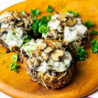 Bruschetta With Mushroom And Montasio Cheese	 · BRUSCHETTA ai FUNGHI e MONTASIO	
Mushroom Bruschetta, Montasio Cheese