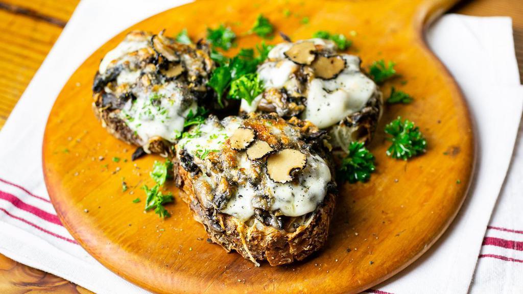Bruschetta With Mushroom And Montasio Cheese	 · BRUSCHETTA ai FUNGHI e MONTASIO	
Mushroom Bruschetta, Montasio Cheese