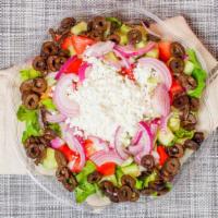 Greek Salad · Romaine lettuce, cucumbers, tomatoes, purple onion, black olives, Feta cheese.
