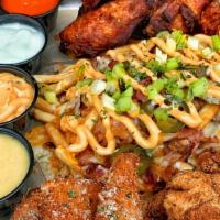 The Elsie Sampler · Naked Wings, Mozzarella Triangles, Chicken Nugs and Live Fry or Die Fries served with Wenzel...