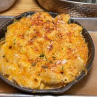 Baked Mac · baked macaroni smothered in american, cheddar, jack and parmesan chesses. Add on grilled or ...