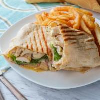 Italian Wrap · Tasty wrap made with grilled chicken, mozzarella cheese, tomatoes, and a pesto sauce. Served...