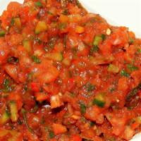 Ezme Salad · Fine minced peppers, mild chili peppers, tomato, walnuts.