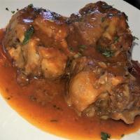 Rabo Encendido · Slow roasted, fall off the bone oxtail in spicy criollo sauce.