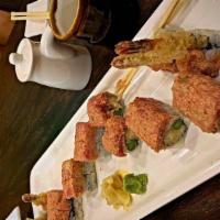 Volcano Roll · Shrimp & asparagus tempura w. spicy tuna, tobiko on top