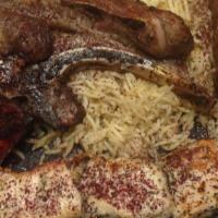 Chef'S Combo Kebab · Combination of lamb tikka, kofta, chicken breast, lamb chop and fish kebabs. Served with bro...