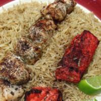 Chicken & Fish Kebab · Served with brown rice, salad and bread.