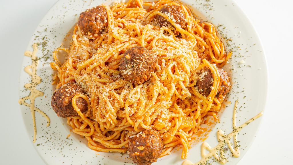 Spaghetti With Meatballs · Spaghetti, meatballs, and tomato sauce.