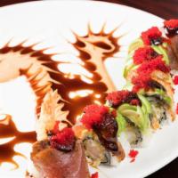 Flaming Dragon Roll · Your dragon roll is on fire, so delicious, shrimp tempura with cucumber on the inside, wrapp...