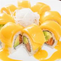 Golden Dragon Roll · Salmon and avocado on the inside, wrapped with mango on the outside with mango sauce.