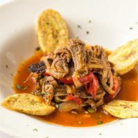 Ropa Vieja Mexicana · Braised beef brisket, Maduro plantains , and black beans,. Classic salsa creole.