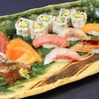 Sushi & Sashimi Combination · An assortment of Sushi & Sashimi (4 kind of sashimi, 5 pieces of sushi and 1 reg roll)