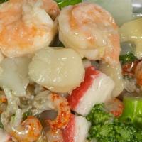 Seafood Combination  海鲜大会 · Fresh shrimp, scallops, and crab sticks with broccoli, baby corn, snow peas, and Chinese veg...