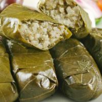Stuffed Grape Leaves · Sarma. Rice, onions, mint, dill, parsley, pine nuts, olive oil and bird grapes.