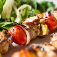 Chicken Shish Kebab · Char-grilled chunks of chicken breasts served with rice and vegetables. Served with rice, pi...