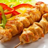 Chicken Adana Kebab · Finely chopped chicken seasoned with spices and herbs, charcoal frilled on skewers, served w...