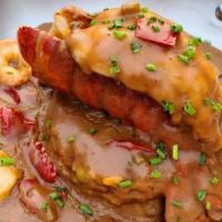 Lobster Gumbo · Smoked sausage, 5 oz maine lobster tail, gulf shrimp, rainbow rice.
