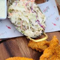 Fried Catfish · Cornmeal crusted catfish, cole slaw, cucumber-lime remoulade.