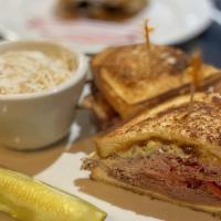 Roasted Beef · With seasoned fried onions, bacon, cheddar cheese & horseradish sauce on grilled sourdough b...