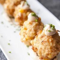 Crabcake Fritters. · Three crunchy crab cake fritters served with our delicious home made remoulade sauce.