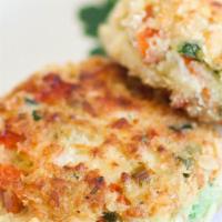 Crab Cakes · Served with a remoulade sauce