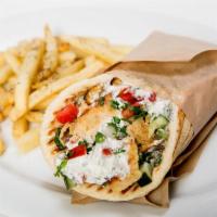 Chicken Gyro Sandwich · Topped with lettuce, tomato and onion.