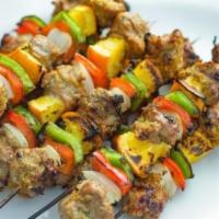 Pork Kebob · Marinated pork chunks with peppers and onions.