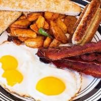Breakfast Platter · Two eggs any style with home fries, choice of meat, toast and your choice of cheese.