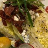 Wedge Salad · Iceberg & arugula lettuce, with cherry tomatoes, bleu cheese crumbles, diced bacon, scallion...