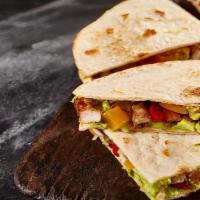 Veggie Quesadilla With Jalapeños · Mouthwatering Quesadilla made with fresh Mozzarella cheese, and cheddar cheese. Topped with ...