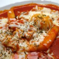 Cream Cheese Tteokbokki (크림치즈 떡볶이) · Cream Tteokbokki features chewy Korean rice cakes smothered in a sweet and spicy gochujang s...