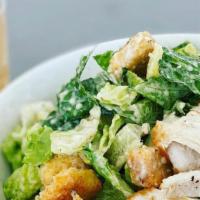 Caesar Salad
 · Chopped romaine hearts croutons parmesan cheese and caesar dressing.