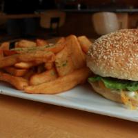 Fusion Burger · Ground beef, shredded cheese, lettuce, tomatoes, toasted bun, seasoned fries, jerk sauce, or...