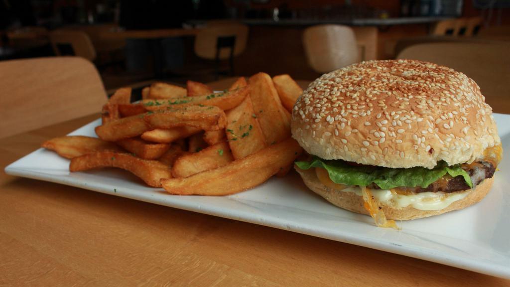 Fusion Burger · Ground beef, shredded cheese, lettuce, tomatoes, toasted bun, seasoned fries, jerk sauce, or ketchup.