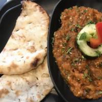 Eggplant Dip With Fig Naan · Grilled roasted, smashed, and served hot.