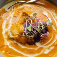 Traditional Butter Chicken · rich creamy tomato sauce and mawa cheese. Gluten free.