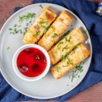 Phyllo Rolls With Feta Cheese · Rolled around feta cheese and parsley.