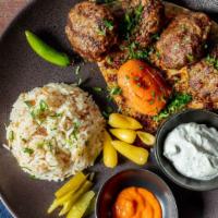 Grilled Turkish Meatballs · Ground lamb and beef seasoned with Turkish spices, served with mashed potato, glazed and car...