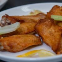 Chicken Wings · Fried, crispy chicken wings - hand-breaded and deep-fried. Flavor choice of cajun, buffalo, ...