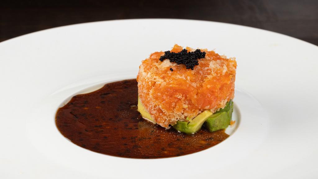 Spicy Salmon Tartar · Chopped salmon with special sauce.