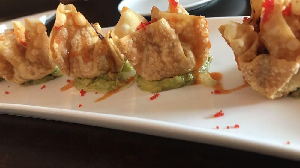 Spicy Tuna Tortilla · Spicy. Spicy tuna wrapped with wonton skin, deep fried and dipped with guacamole.