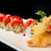Red Dragon Roll · Shrimp tempura, cucumber inside topped with spicy crunchy tuna.